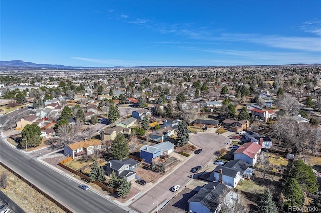 aerial view featuring a mountain view and a residential view