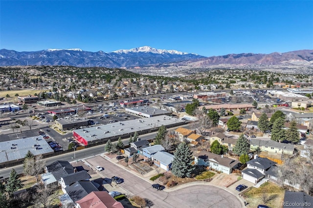 birds eye view of property featuring a mountain view