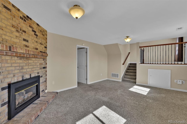 unfurnished living room with carpet flooring, baseboards, and visible vents