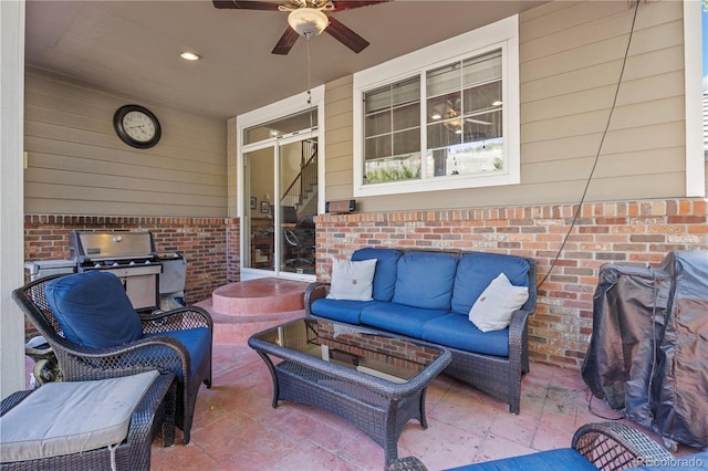 view of patio / terrace featuring area for grilling, outdoor lounge area, and ceiling fan