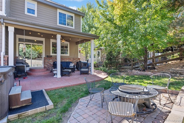 6987 Esperanza Dr, Castle Pines, CO 80108 - view of patio / terrace with an outdoor living space with a fire pit, fence, and ceiling fan