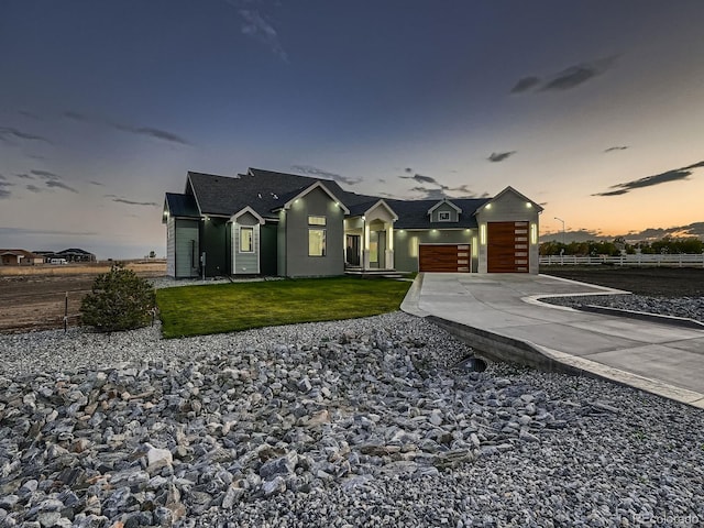 view of front of house with a yard