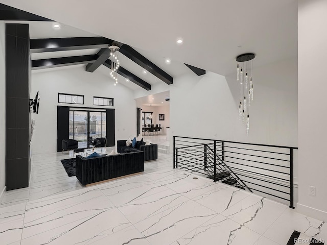 living room with lofted ceiling with beams