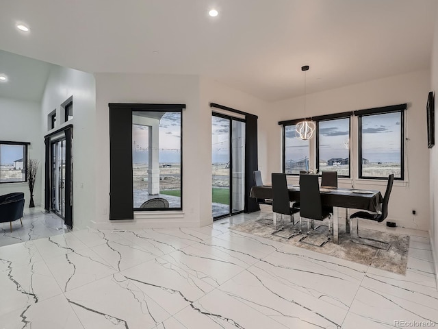 dining room with a chandelier