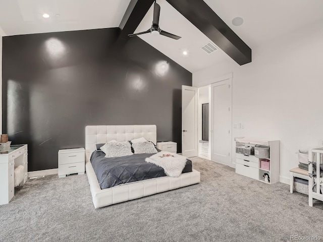 carpeted bedroom with vaulted ceiling with beams and ceiling fan