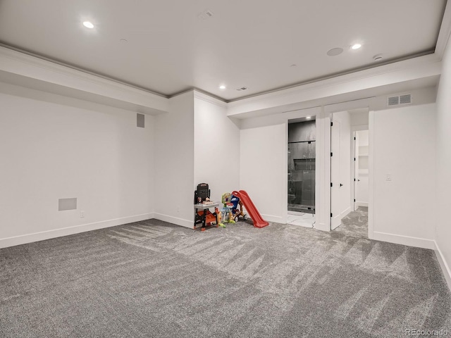 playroom featuring crown molding and carpet