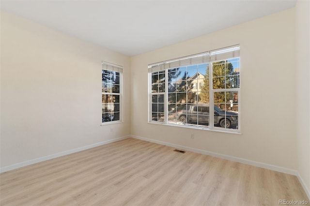 empty room featuring light hardwood / wood-style floors