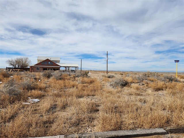 view of yard featuring a rural view