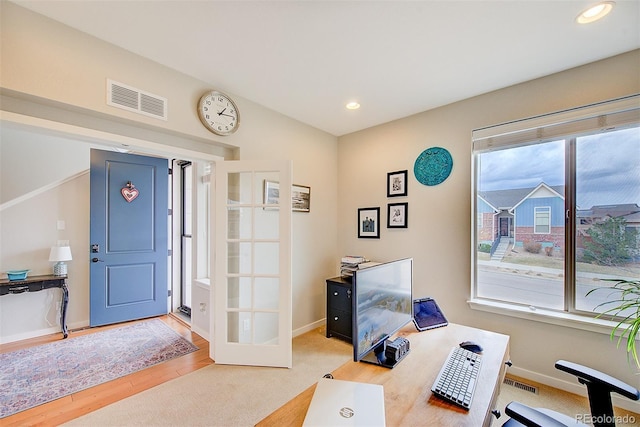 office with light wood-type flooring, recessed lighting, visible vents, and baseboards