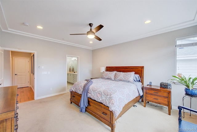 bedroom with recessed lighting, light carpet, connected bathroom, and baseboards