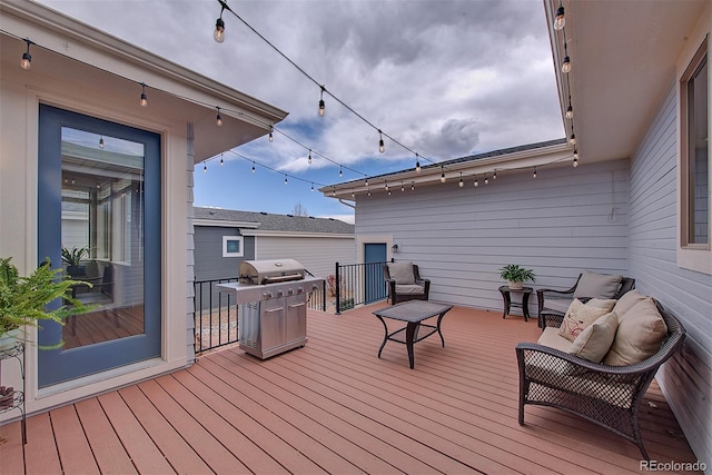 wooden terrace with area for grilling