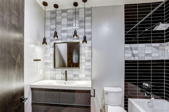 133 Adams Way, Breckenridge, CO 80424 - bathroom featuring toilet, vanity, decorative backsplash, tile walls, and shower / bathtub combination