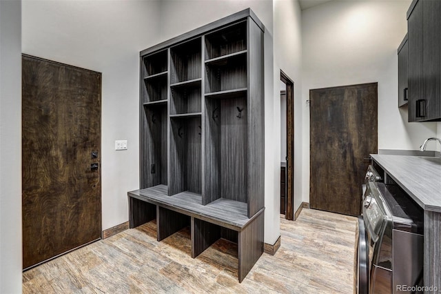 133 Adams Way, Breckenridge, CO 80424 - mudroom featuring light wood-type flooring and baseboards