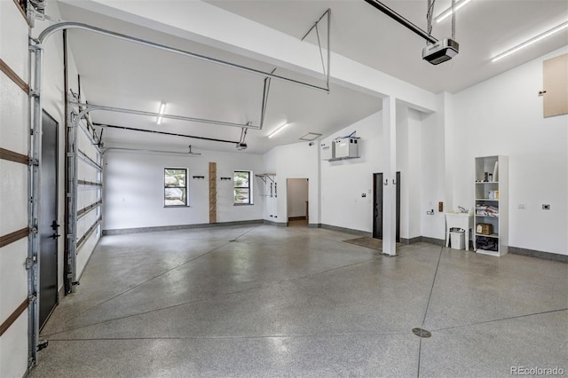 133 Adams Way, Breckenridge, CO 80424 - garage with a garage door opener and baseboards
