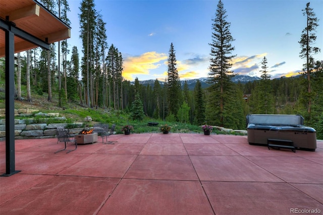 133 Adams Way, Breckenridge, CO 80424 - view of patio / terrace featuring an outdoor fire pit and a forest view
