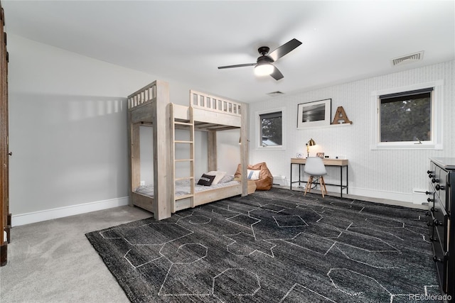 bedroom featuring carpet flooring, visible vents, and baseboards