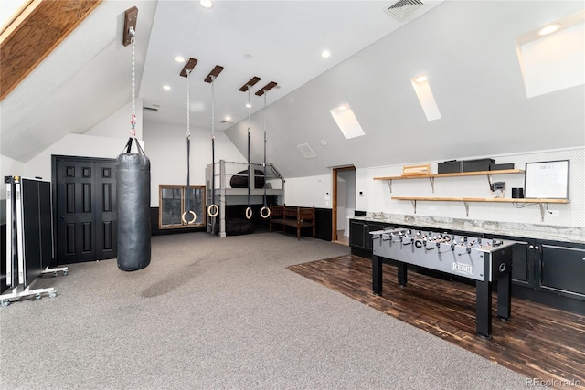 playroom featuring lofted ceiling and visible vents