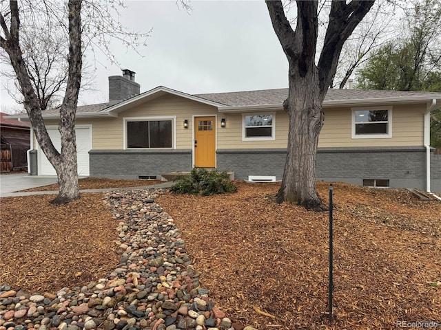 6448 Ingalls Ct, Arvada, CO 80003 - single story home with roof with shingles, a garage, a chimney, and brick siding