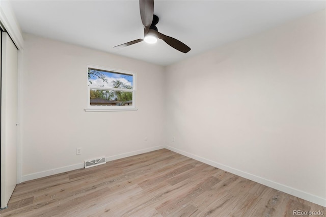 6448 Ingalls Ct, Arvada, CO 80003 - unfurnished bedroom featuring light wood finished floors, a ceiling fan, a closet, visible vents, and baseboards
