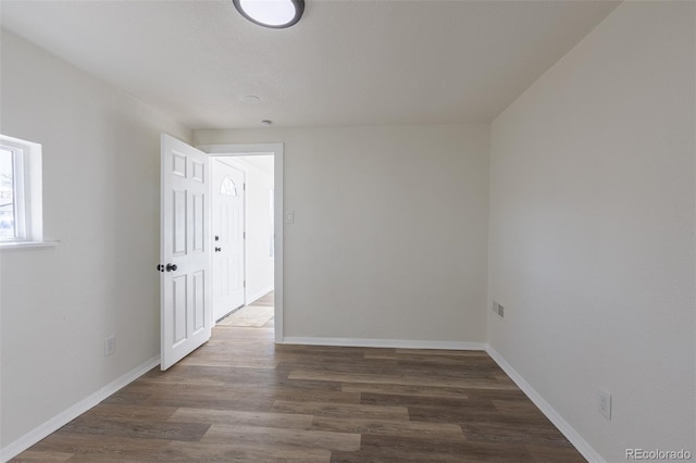 1435 Jay St, Lakewood, CO 80214 - empty room with baseboards and wood finished floors