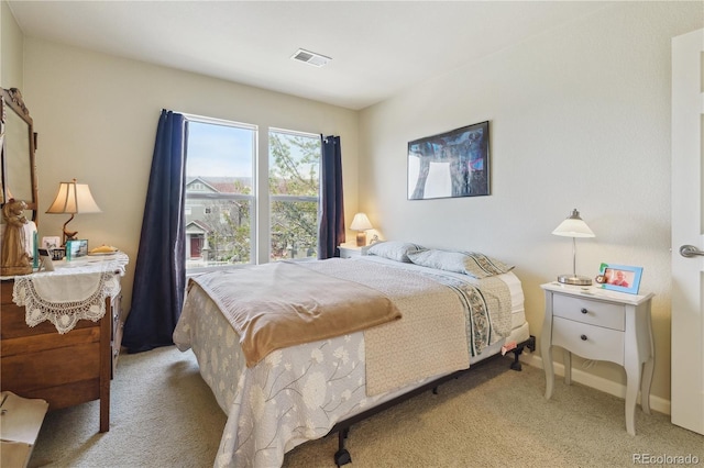 4061 Nordland Trl, Castle Rock, CO 80109 - bedroom featuring baseboards, light carpet, and visible vents