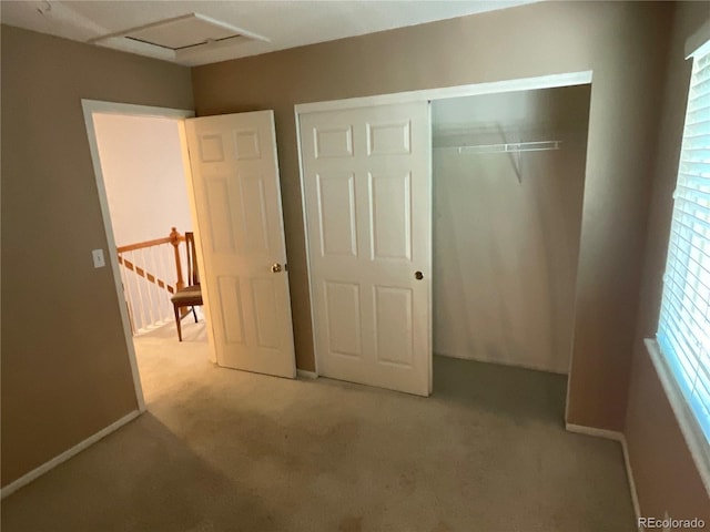 21300 E 42nd Ave, Denver, CO 80249 - unfurnished bedroom with light carpet, a closet, and baseboards