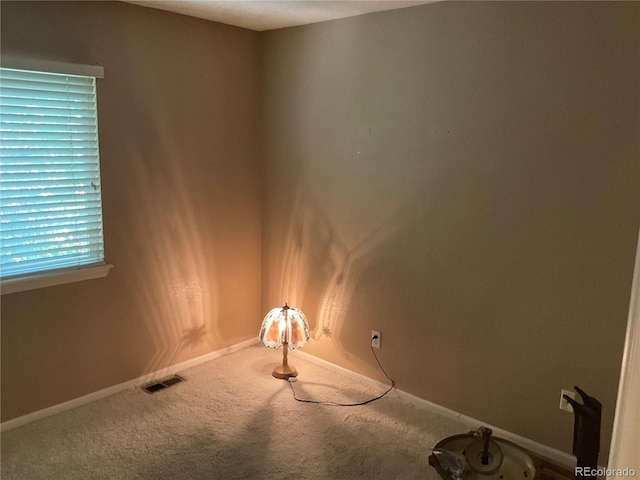 21300 E 42nd Ave, Denver, CO 80249 - carpeted spare room featuring baseboards