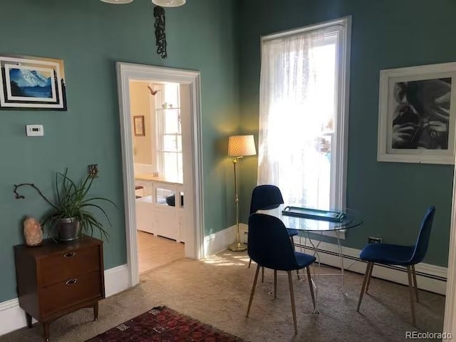 sitting room with light colored carpet