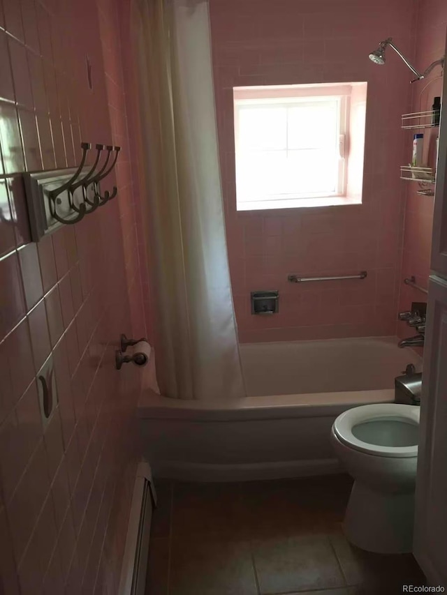 bathroom with toilet, shower / bath combination with curtain, tile patterned flooring, and a baseboard heating unit