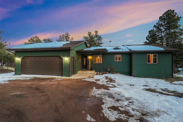 ranch-style house with a garage