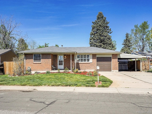 5225 Beech St, Arvada, CO 80002 - single story home featuring driveway, a garage, brick siding, and an attached carport