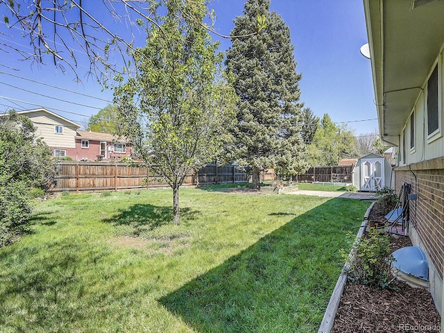 5225 Beech St, Arvada, CO 80002 - view of yard featuring a storage unit and an outbuilding