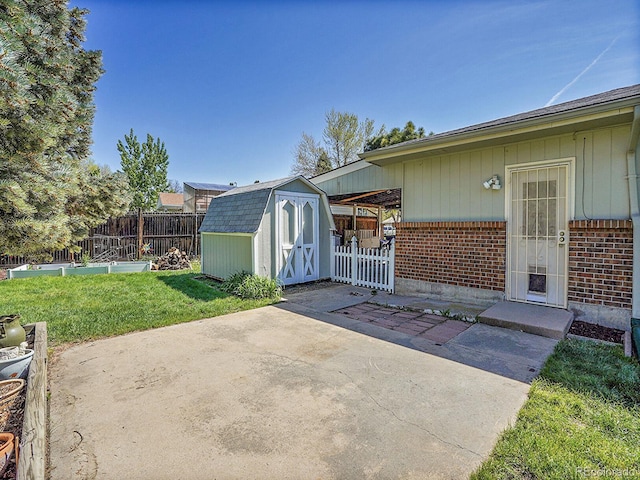 5225 Beech St, Arvada, CO 80002 - view of patio with a shed and an outdoor structure