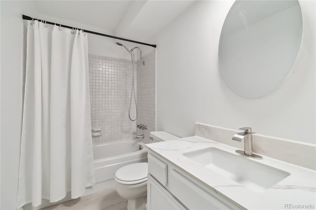 full bath featuring vanity, shower / bath combo, and toilet