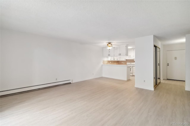 unfurnished living room with baseboards, a baseboard radiator, light wood-style flooring, and a ceiling fan
