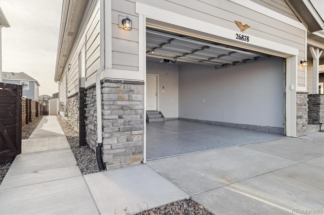 doorway to property featuring a garage