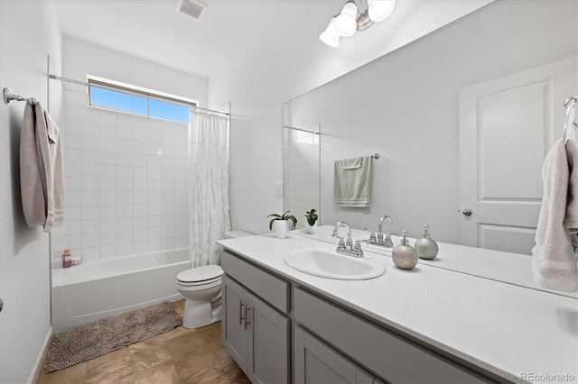 full bathroom featuring vanity, toilet, and shower / bath combo with shower curtain