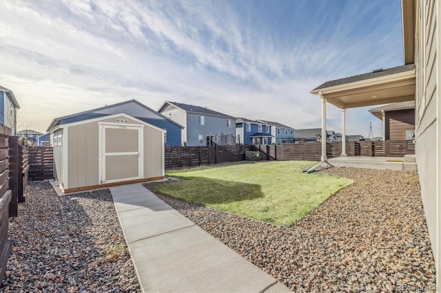 view of yard featuring a storage shed