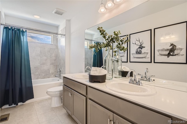 bathroom featuring tile patterned flooring, shower / bath combination with curtain, double vanity, and a sink