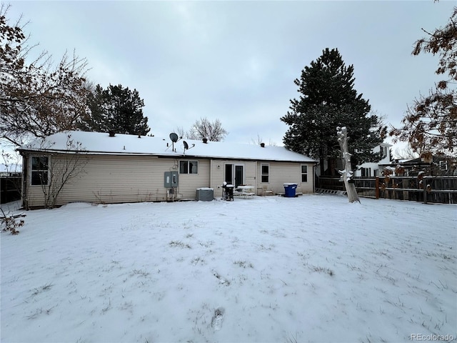 view of snow covered property