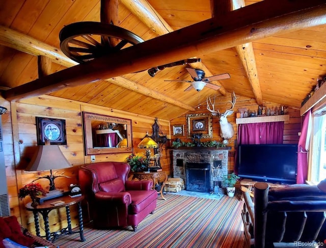 22585 County Road 292, Nathrop, CO 81236 - living room featuring wooden walls, wooden ceiling, ceiling fan, carpet floors, and a stone fireplace