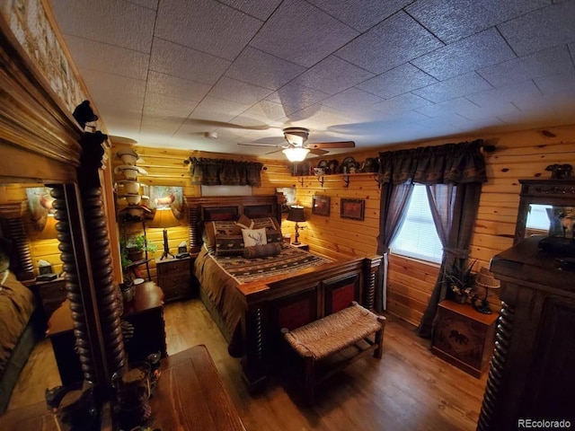 22585 County Road 292, Nathrop, CO 81236 - bedroom featuring wood finished floors and wood walls