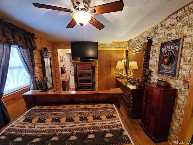 22585 County Road 292, Nathrop, CO 81236 - office space with ceiling fan, wood finished floors, and wooden walls