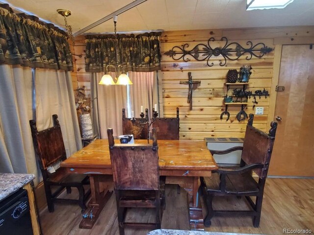 22585 County Road 292, Nathrop, CO 81236 - dining area with wood finished floors and wood walls
