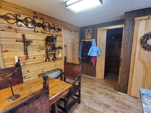 22585 County Road 292, Nathrop, CO 81236 - dining area with wood walls and light wood-type flooring