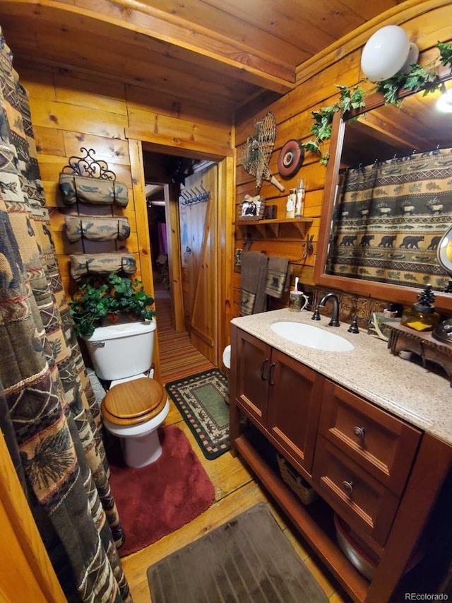 22585 County Road 292, Nathrop, CO 81236 - bathroom with vanity, wood walls, wood ceiling, and wood finished floors