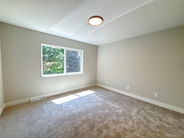 7160 E Iliff Ave, Denver, CO 80224 - carpeted spare room featuring baseboards