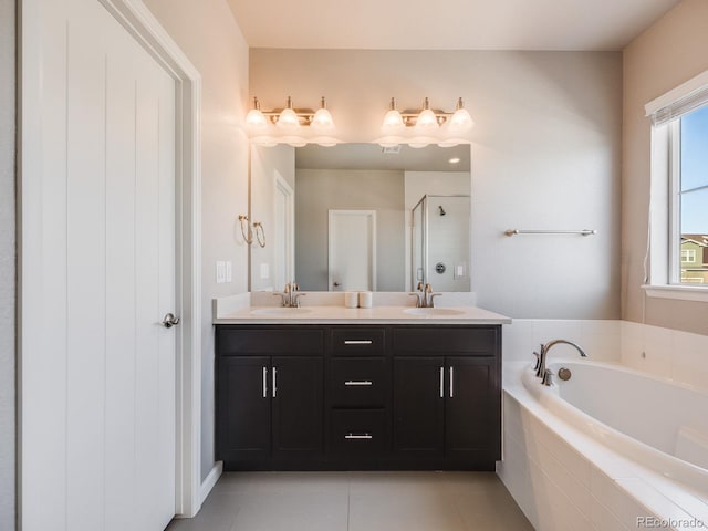 bathroom with vanity, separate shower and tub, and tile patterned floors