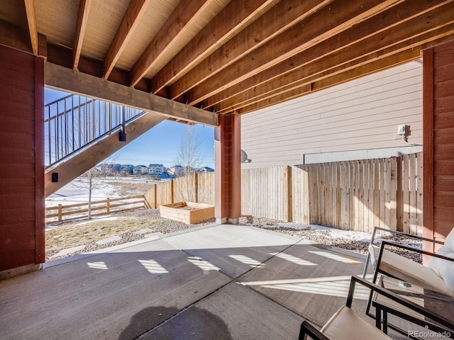 view of snow covered patio