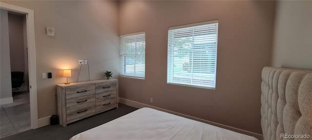 bedroom featuring dark hardwood / wood-style floors